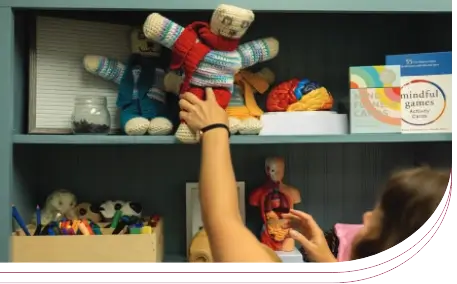 Photo of a person taking out a toy