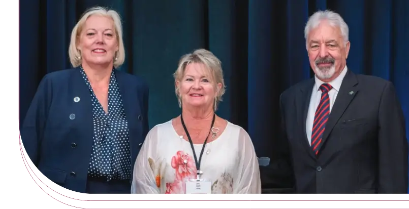 Photo of Jennifer Wilson, Chair of Hospice Palliative Care Ontario's Board of Directors, Lorie Ring, Award Recipient, and Fred Tufnell, Chancellor of Saint Lazarus Canada