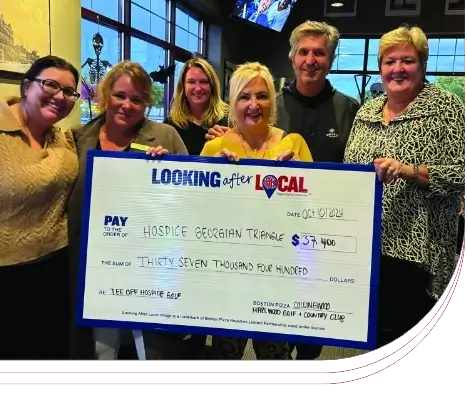 Photo of Amber McGuirk, Linda Caron, Sandra Sullivan, Sandy Smardenka, Alex Smardenka, and Gail Gibbons