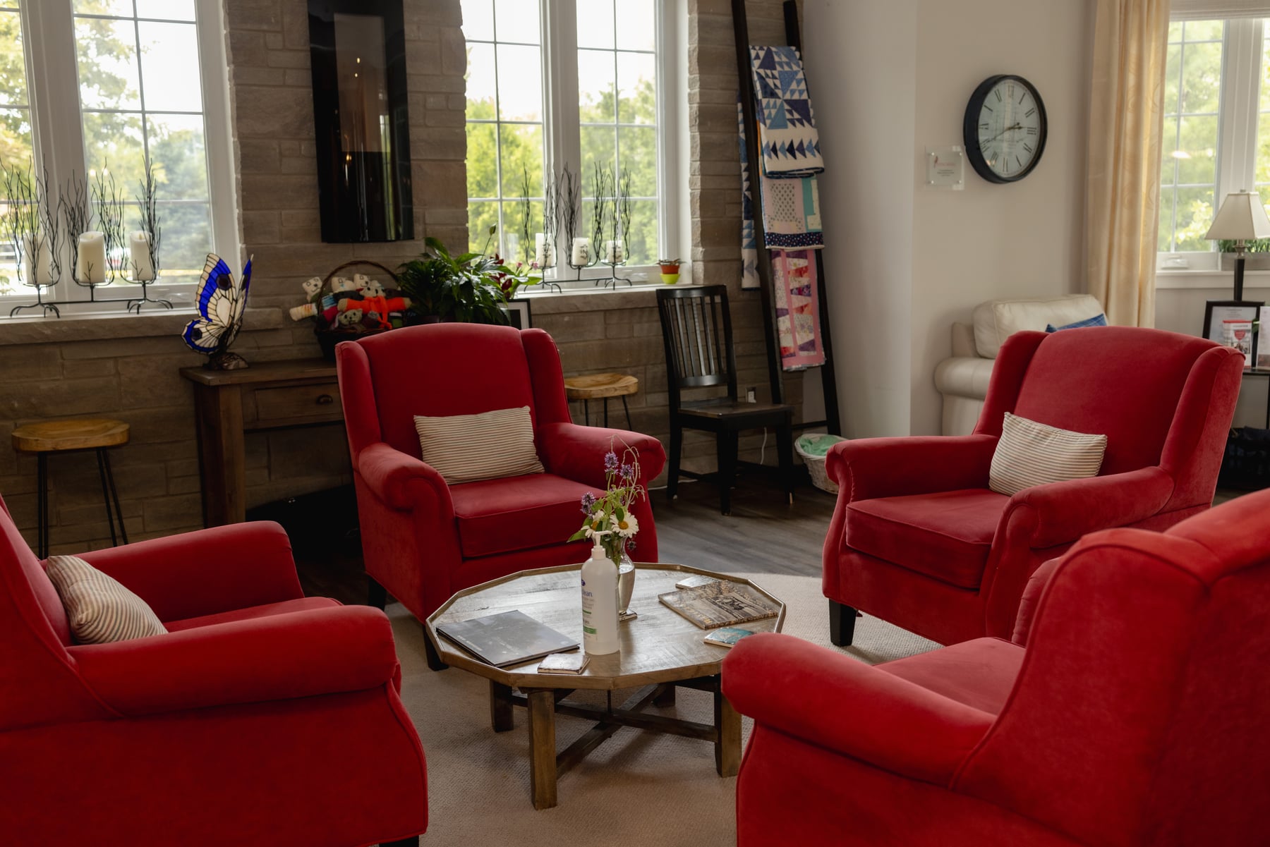 Red chairs in a welcoming room at Campbell House