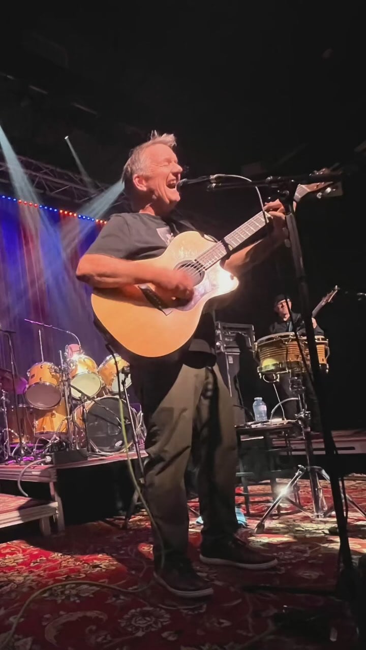 Jim Harrison performing with Jimmy and the Extractions